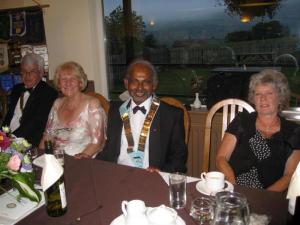 District Governor John Philip and Chris, with President Laurie Kent and Margaret